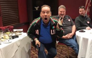 A man acting surprised on finding a dead character