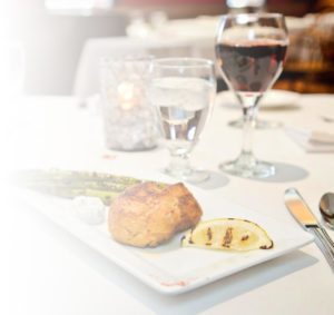 Entree on an upscale white tablecloth